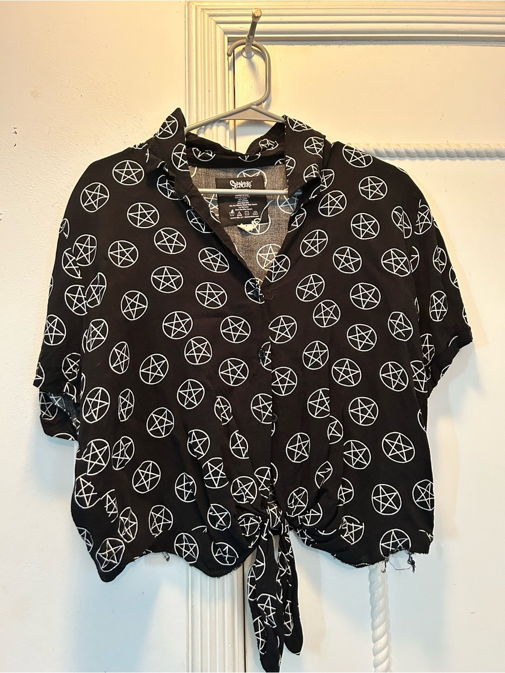 Spencer's Black Button-Down Tie Front Top with White Pentagram Print